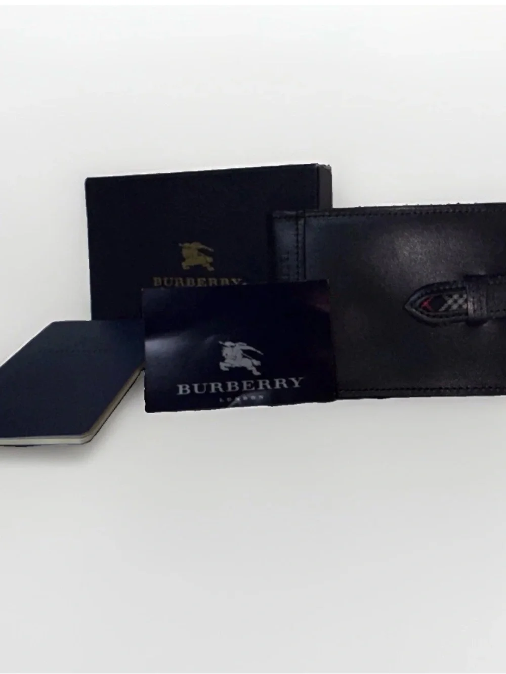 Burberry’s Black Leather Men's Wallet with Plaid Interior
